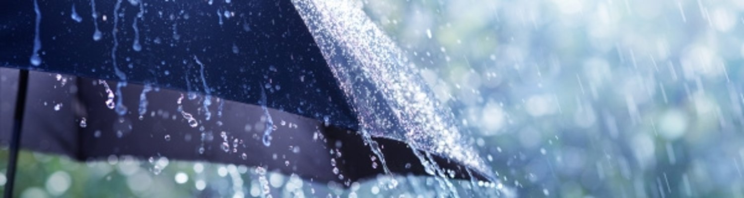Rain On Umbrella - Weather Concept starkregen